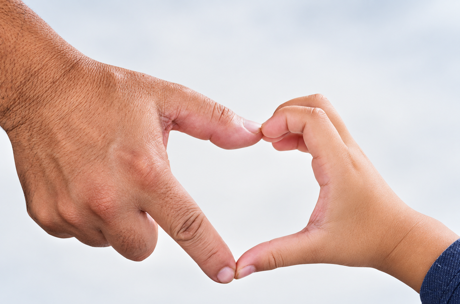 Two hands forming a heart shape
